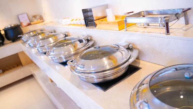 Отель Ji Daqing Tieren Plaza