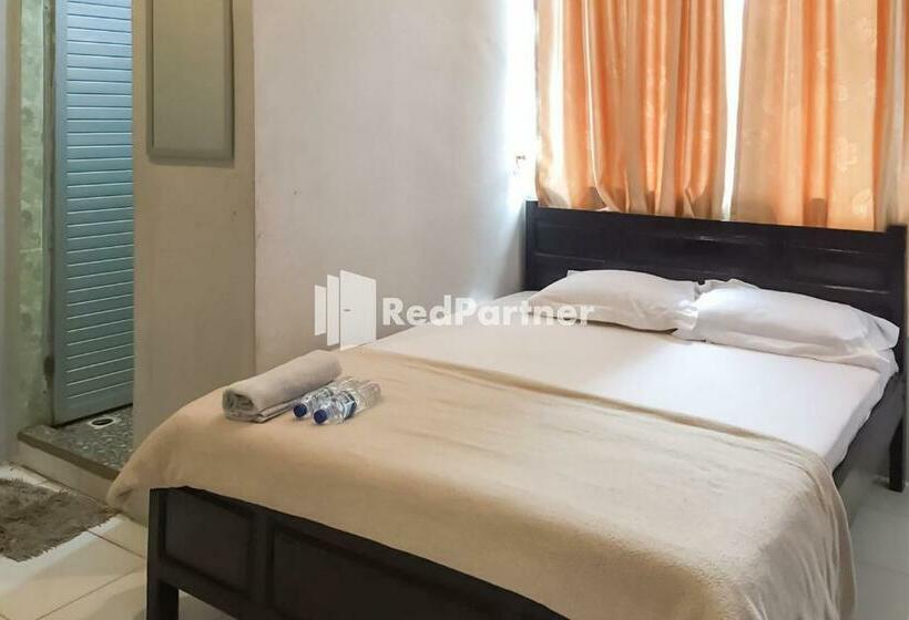 Отель Aquino Marito Homestay Mitra Reddoorz