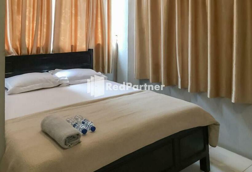 Отель Aquino Marito Homestay Mitra Reddoorz