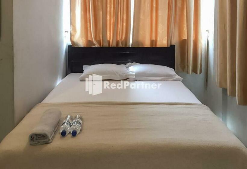 Отель Aquino Marito Homestay Mitra Reddoorz