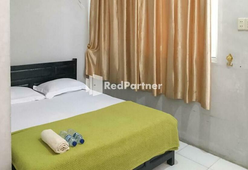 Отель Aquino Marito Homestay Mitra Reddoorz