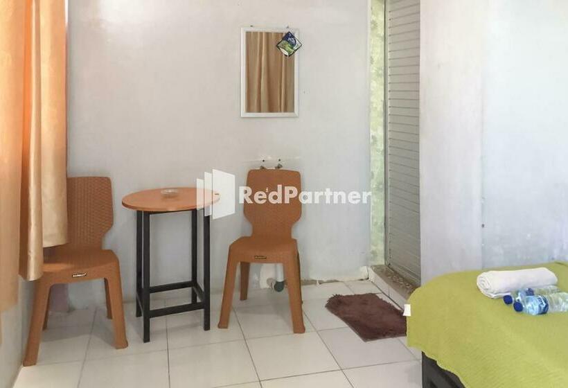 Отель Aquino Marito Homestay Mitra Reddoorz
