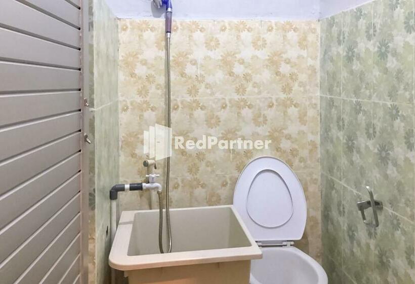 Отель Aquino Marito Homestay Mitra Reddoorz