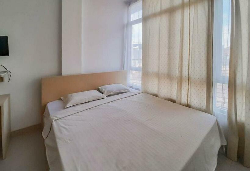 Отель Happyland Home Syariah Redpartner