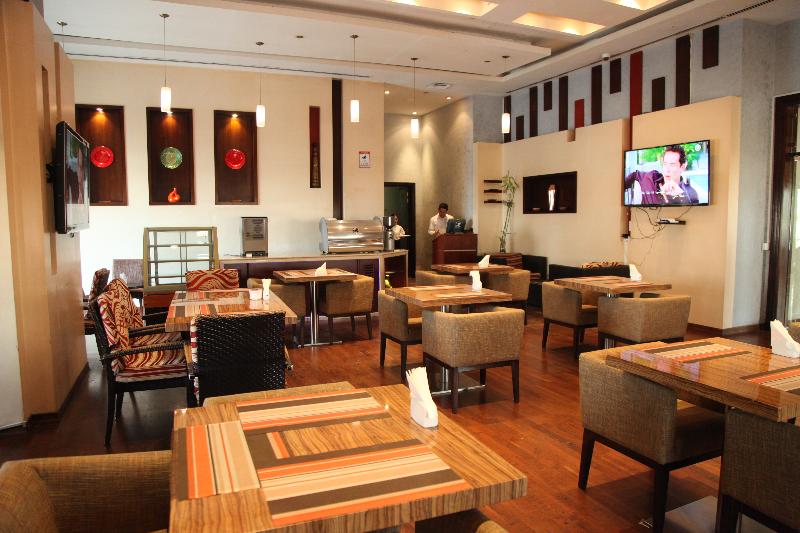 اقامتگاه Magnum Hotel & Suites West Bay