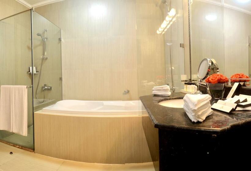 اقامتگاه Magnum Hotel & Suites West Bay