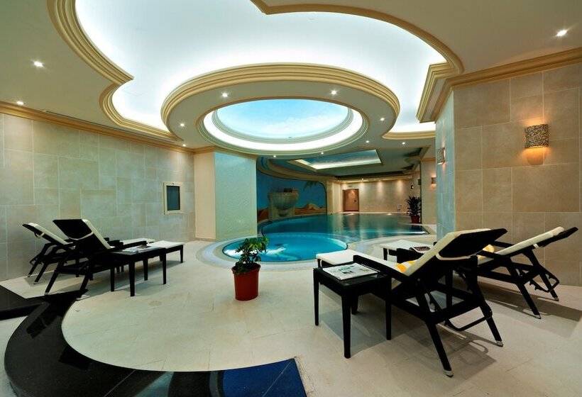 اقامتگاه Magnum Hotel & Suites West Bay