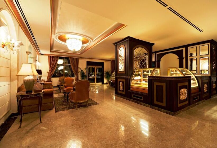 اقامتگاه Magnum Hotel & Suites West Bay