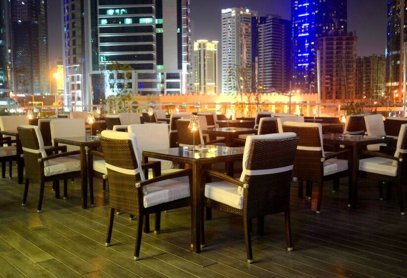 اقامتگاه Magnum Hotel & Suites West Bay