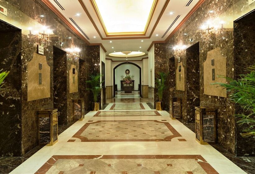 اقامتگاه Magnum Hotel & Suites West Bay