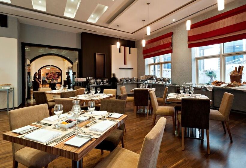 اقامتگاه Magnum Hotel & Suites West Bay