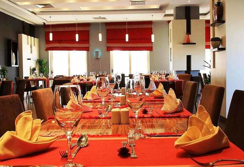 اقامتگاه Magnum Hotel & Suites West Bay