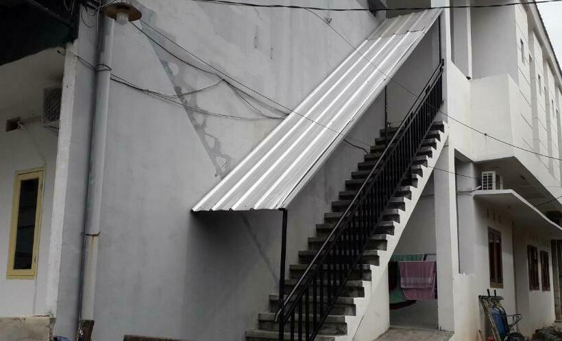 Отель Oyo 90939 Guesthouse Yansen Residence