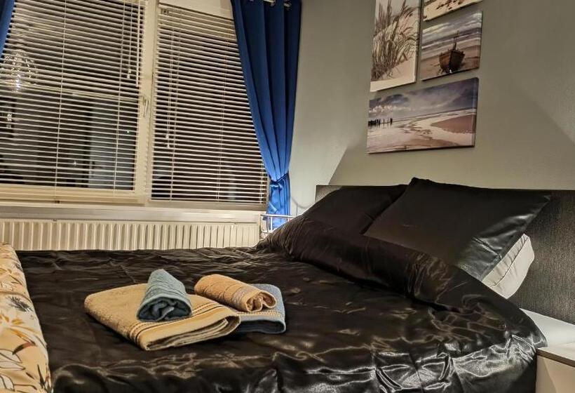 تختخواب و صبحانه Breakfast At Carin’s