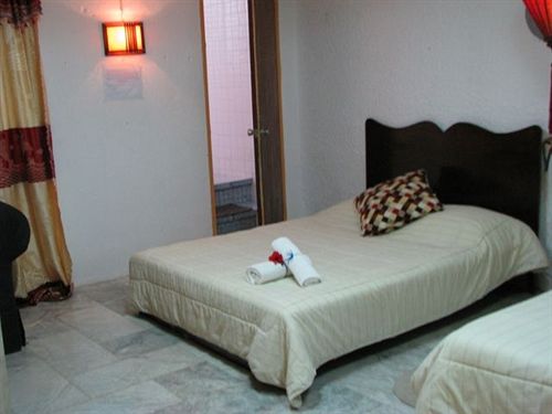 בית מלון כפרי Niu Ohana Garden Resort