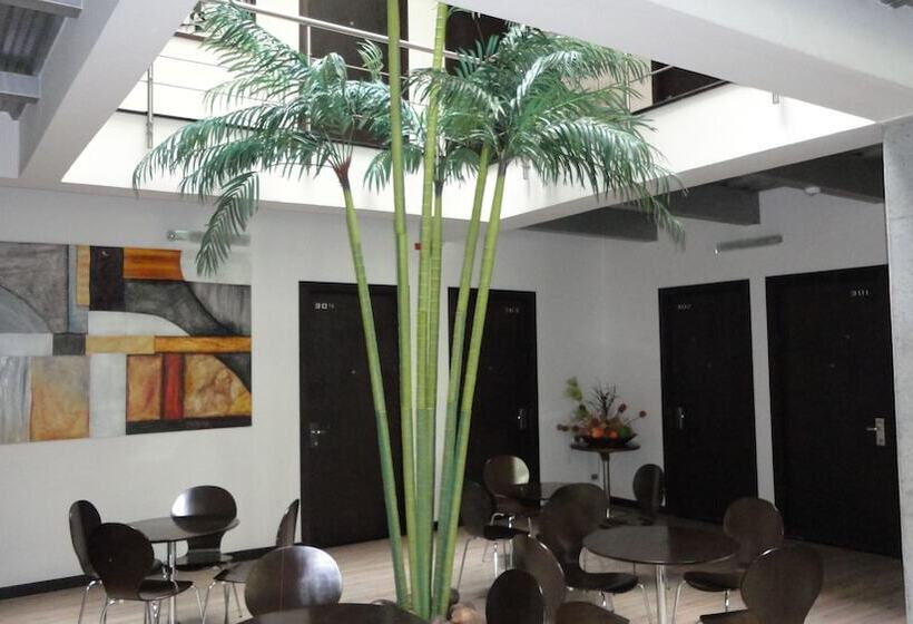 호텔 Habitat Suites