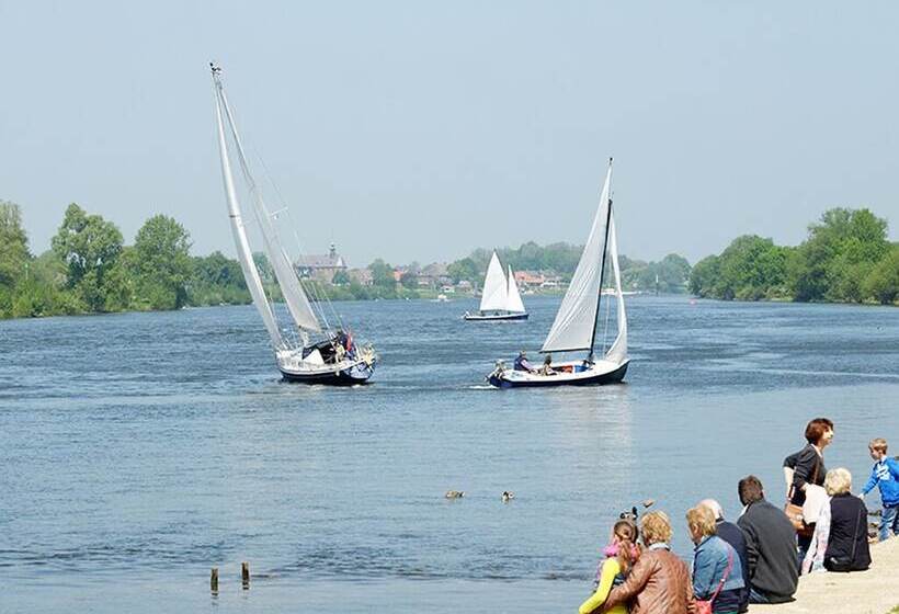 בית מלון כפרי De Maasparel Nextdoor Maassuites