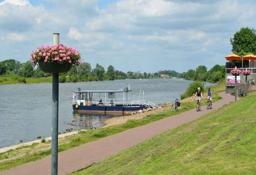 בית מלון כפרי De Maasparel Nextdoor Maassuites