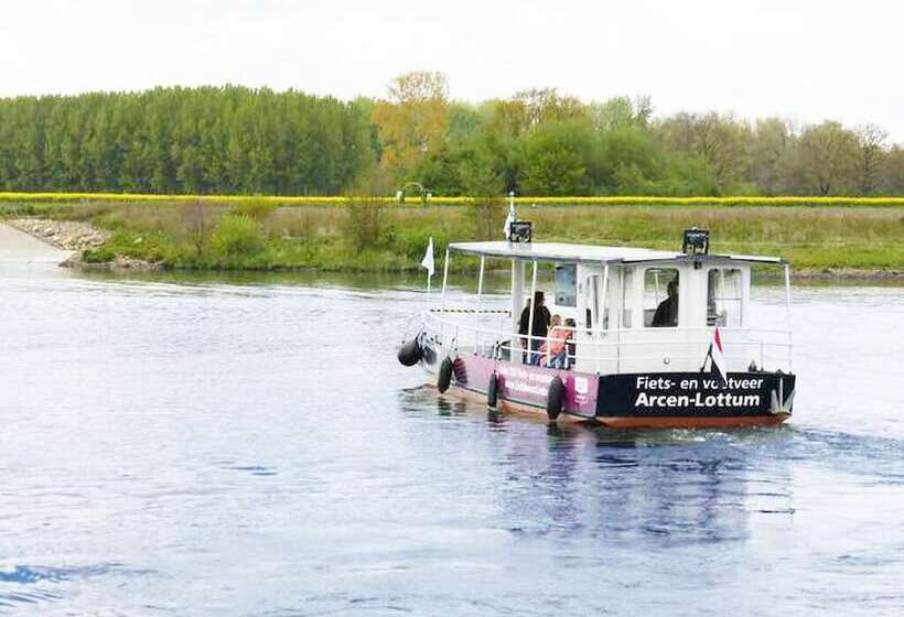 בית מלון כפרי De Maasparel Nextdoor Maassuites