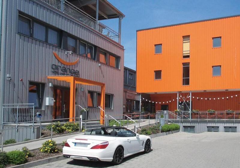 Orange Hotel Und Apartments