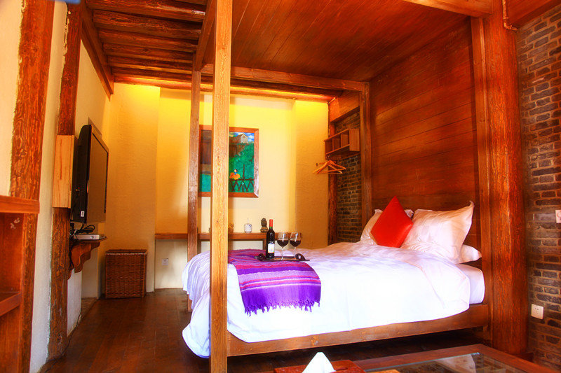 Отель Blossom Hill Inn Lijiang Springland