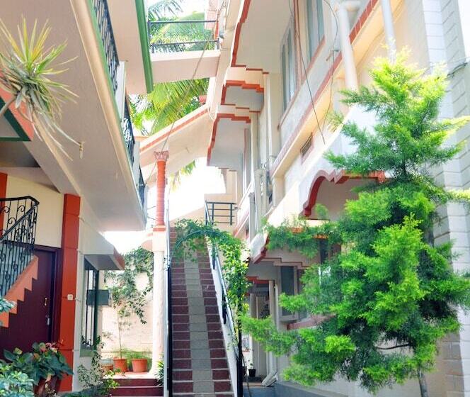 호텔 Four Seasons Homestay Coorg