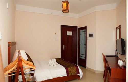 בית מלון כפרי Qing Tian Yu Tan Service Apartment