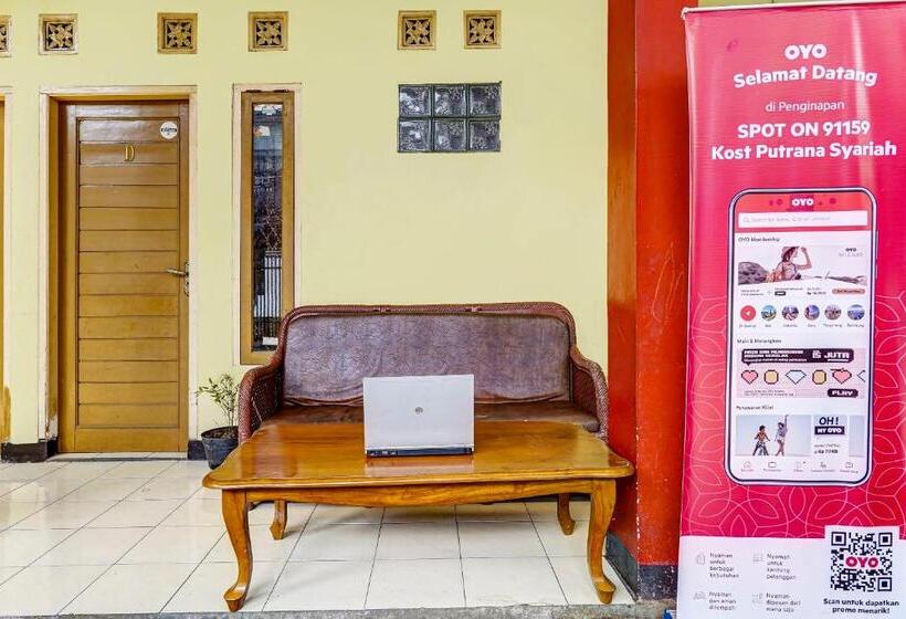 Отель Spot On 91159 Kost Putrana Syariah