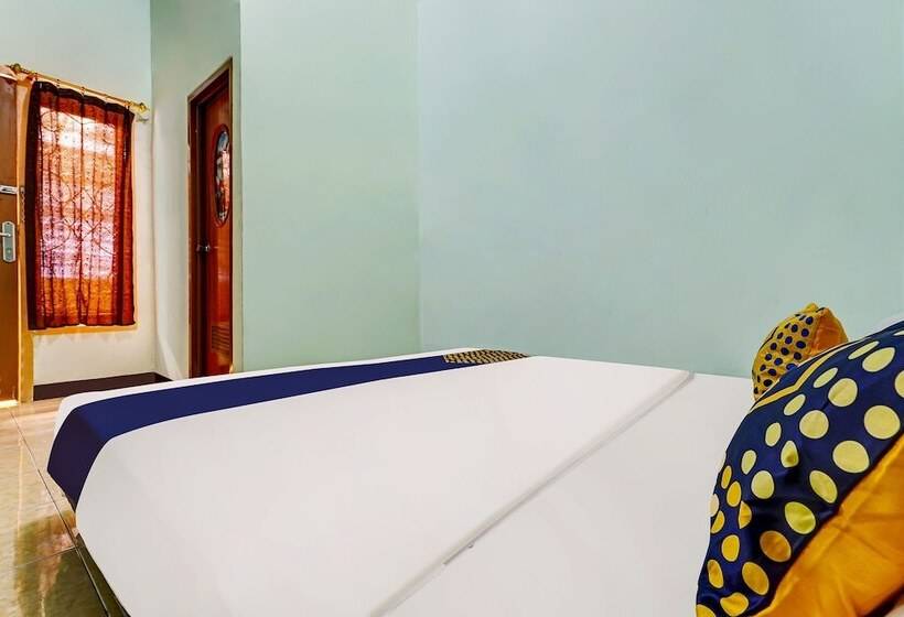 Отель Spot On 91159 Kost Putrana Syariah