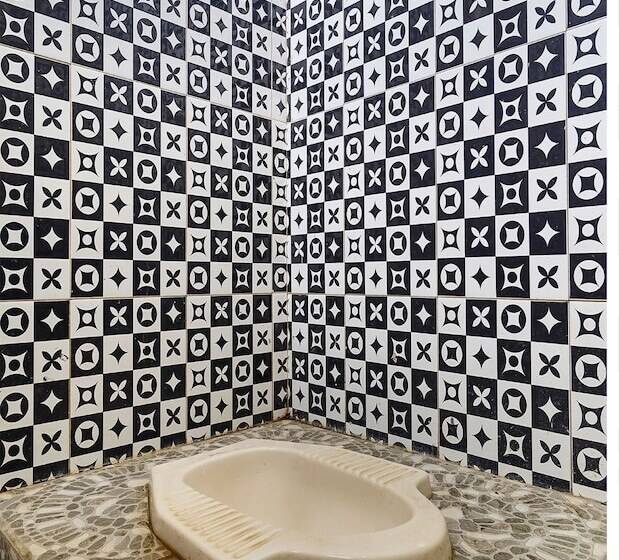 Отель Oyo Homes 91156 Eco Tourism Big Farmer Desa Kertawangi Syariah