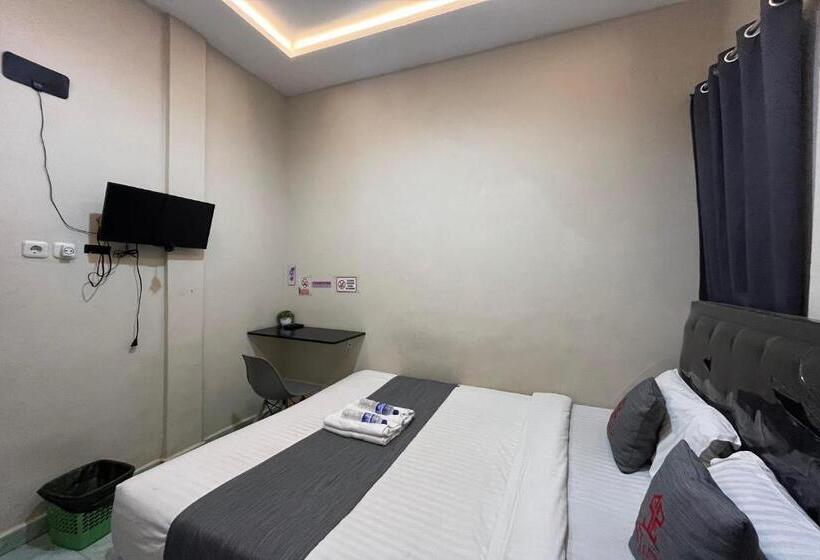 호텔 Steze Guesthouse Syariah Mendalo