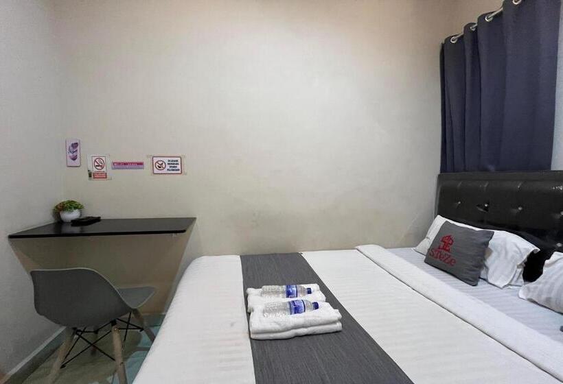 호텔 Steze Guesthouse Syariah Mendalo