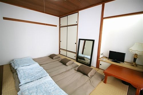 ペンション Guest House Okinawa Monogatari