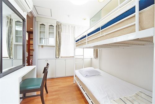 ペンション Guest House Okinawa Monogatari