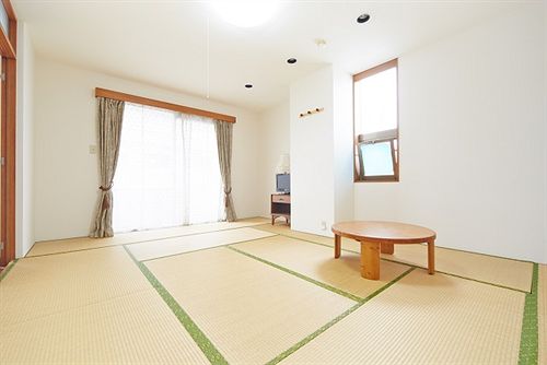 ペンション Guest House Okinawa Monogatari