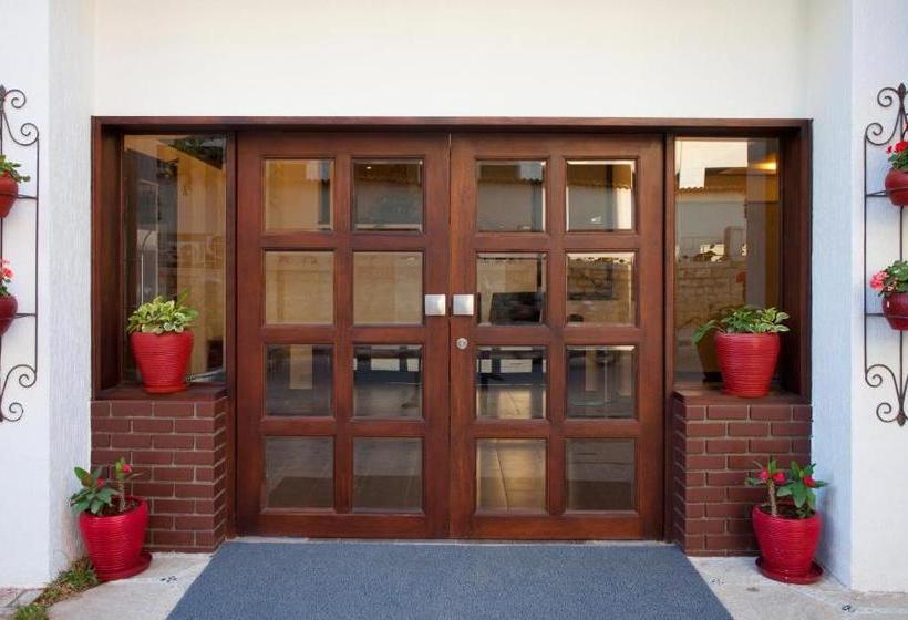 Отель Orchid Suites Bangalore