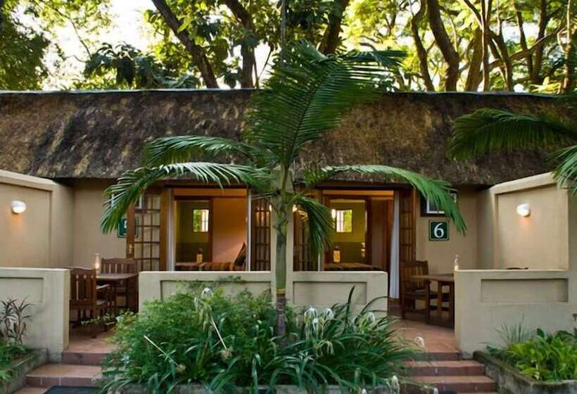 Отель Numbi & Garden Suites