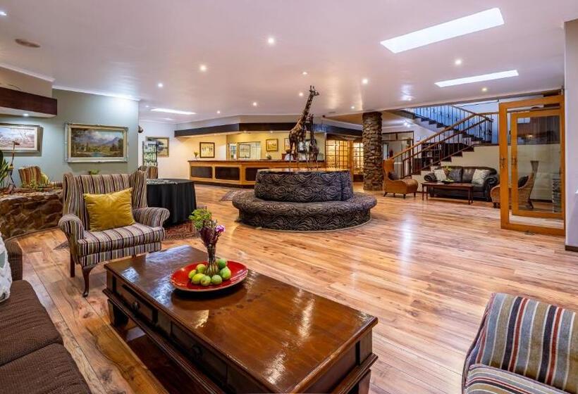 Отель Numbi & Garden Suites