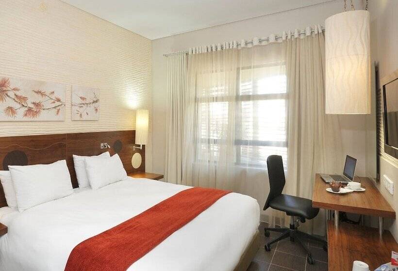 בית מלון כפרי Peermont Metcourt At Umfolozi Empangeni