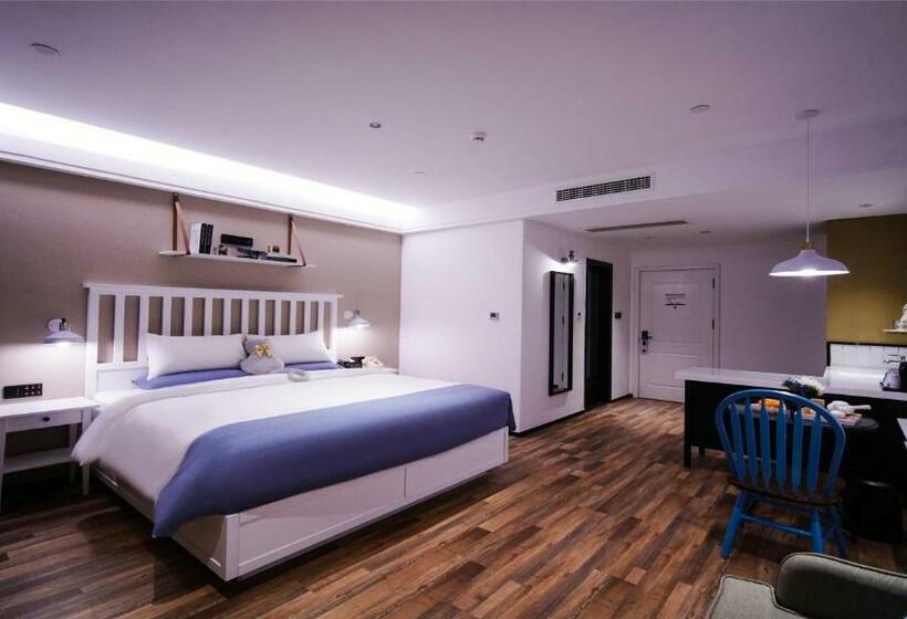 בית מלון כפרי 银座精宿泰安高铁站泰山西湖店