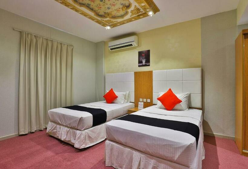 هتل Capital O 338 Asian