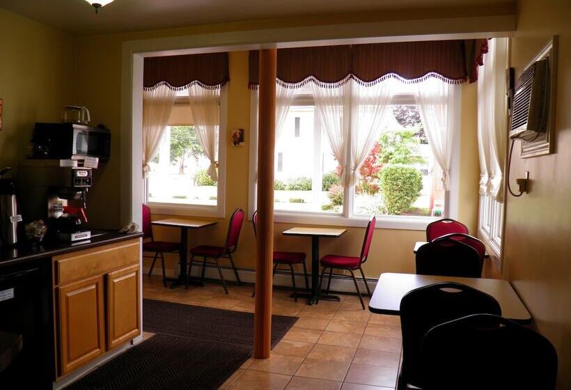 호텔 Travelers Inn