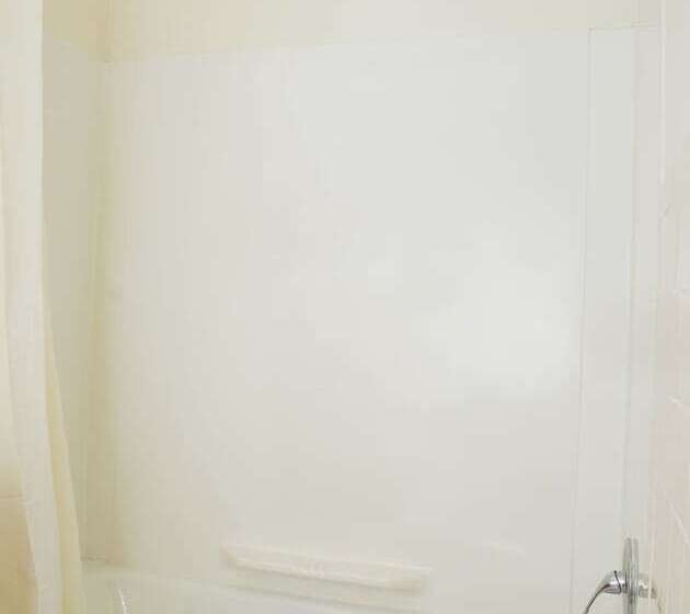 호텔 Travelers Inn