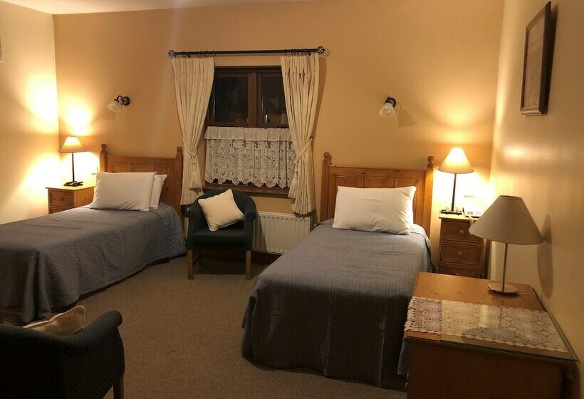 פנסיון The Courtyard Guesthouse B&b