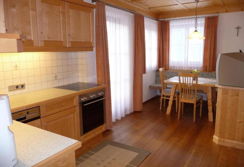 فندق Ferienwohnungen & Almhütten Gutwenger