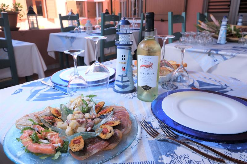 ホテル Torre Del Porticciolo Camping Village Gampling