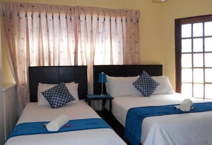 Пансион Village Court Guest House