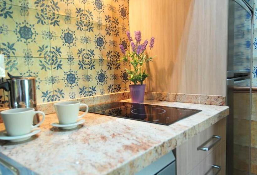 فندق Apartamentos Llugarón