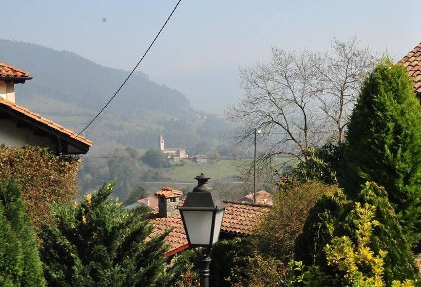 فندق Apartamentos Llugarón