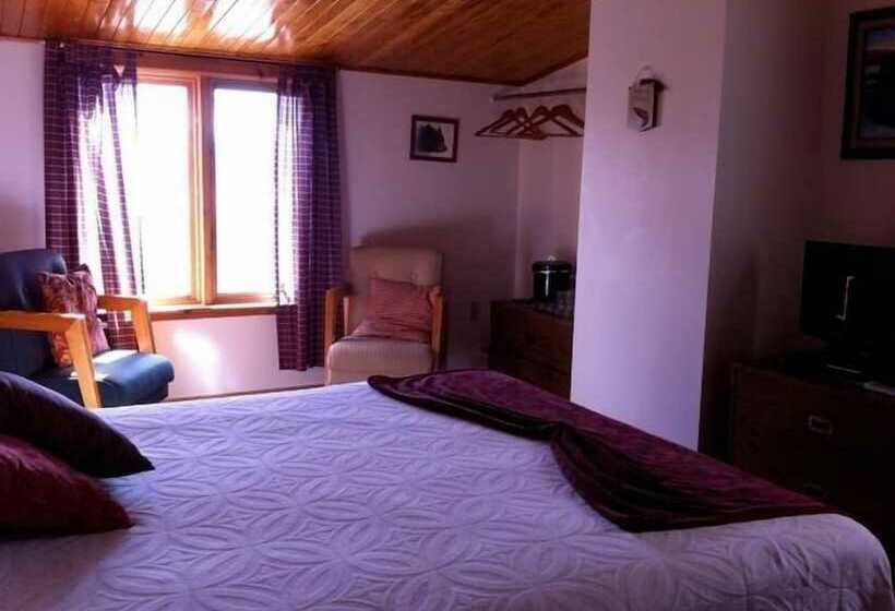 호텔 Green Highlander Lodge